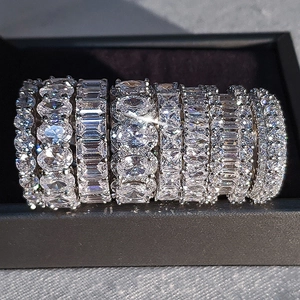 Luxury eternity rings with multiple diamond cuts like emerald and oval in silver setting