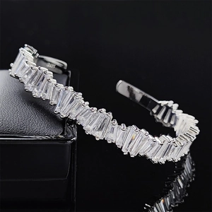Macro shot of S925 sterling silver stamp and sparkling baguette zircon on the cuff bracelet