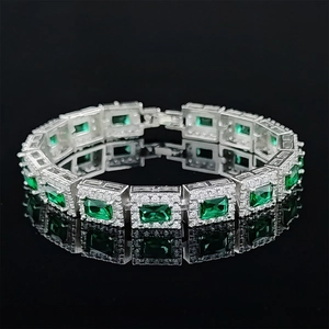 Detail of emerald green rectangular crystal bracelet with sparkling silver micro-pave setting
