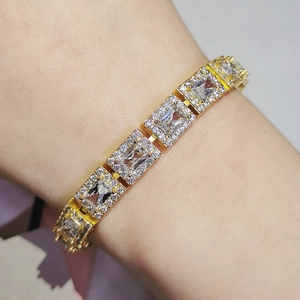 Detail shot of 18K gold plated zircon bracelet on wrist showing premium craftsmanship