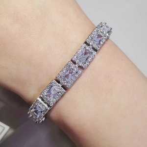 Macro shot of 18K silver plated bracelet featuring rectangle zircon halo link stones
