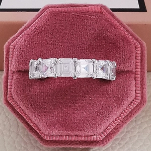 Elegant square-cut moissanite eternity ring in silver finish with premium velvet gift box