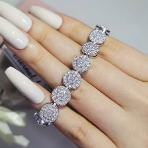 Macro detail of silver plated tennis bracelet featuring sparkling round pave zircons