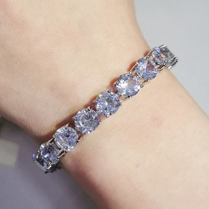 Sparkling silver Y2K tennis bracelet featuring round brilliant-cut cubic zirconia stones
