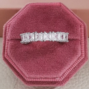 Luxury silver ring featuring five square-cut zircons set in an elegant pink velvet box