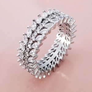 Macro detail of luxury silver ring with multi-layer marquise and round zircon settings
