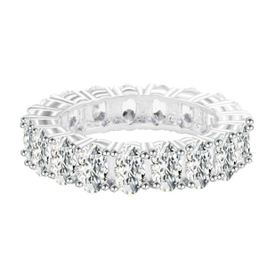 Sparkling eternity ring featuring oval-cut cubic zirconia in a silver-tone pavé setting