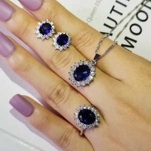 Mode Sonnenblume Schmuckset mit blauen ovalen Saphirsteinen und Zirkonia Akzenten