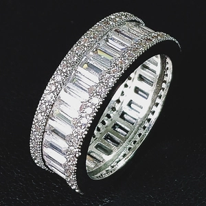Macro detail of luxury wide band ring featuring three rows of rectangular and pavé zircons