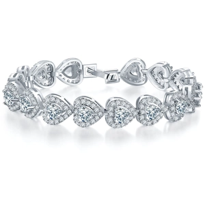 Sparkling 18K gold plated heart bracelet with full zircon inlay on white background