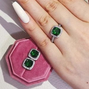 Elegant cushion-cut emerald green gemstone ring and stud earrings set in silver finish