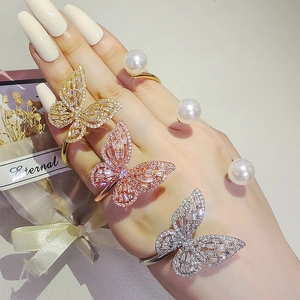 Three-piece butterfly open ring set in gold, rose gold, and silver with zircon pave setting