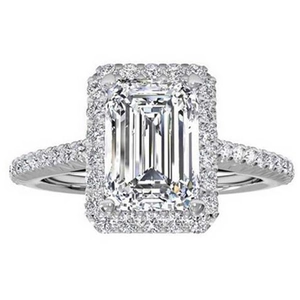 Emerald cut halo ring with pavé diamond setting in white gold for elegant women