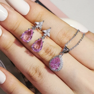 Sparkling pink pear-cut crystal jewelry set including teardrop necklace and earrings