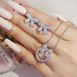 Bowknot jewelry set with zircon stud earrings and pendant necklace in silver finish