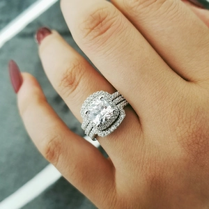 Three-in-one luxury square cushion cut halo engagement ring set in polished silver finish