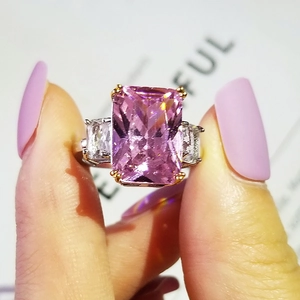Luxury 18K gold plated ring with large radiant cut pink crystal and trapezoid side stones