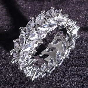 Macro close-up of S925 silver eternity ring with marquise-cut zircon stones