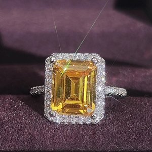 Fashion champagne emerald cut yellow gemstone engagement ring with halo setting