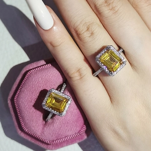 Elegant rectangle champagne gemstone ring with micro-pave diamonds in pink velvet box