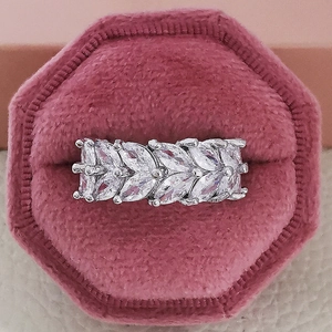 Elegant silver marquise cut leaf shaped zircon ring displayed on a velvet gift box