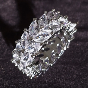 Luxurious marquise cut cubic zirconia leaf ring in silver finish on velvet
