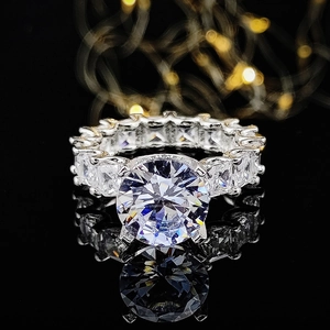 Sparkling engagement ring with 3A zircon center stone and diamond-encrusted silver band