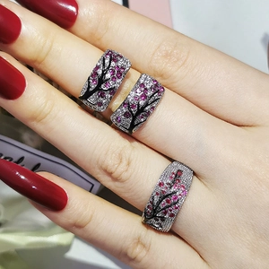 Exquisite branch floral rings with pave micro-set diamonds and pink gemstone inlays