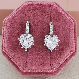 Sparkling heart-shaped zircon drop earrings in a pink velvet jewelry gift box