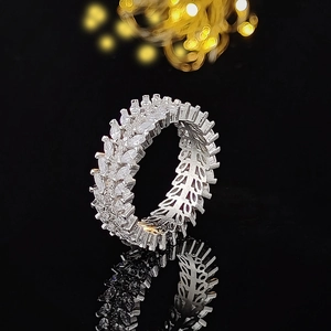 Luxury silver willow leaf eternity ring with marquise-cut zircons and jagged edge detail