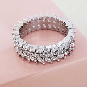 Detailed macro view of silver-toned double layer marquise and round cut crystal ring