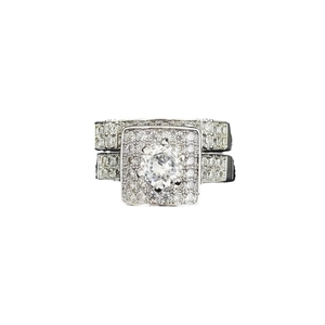 Sparkling silver round-cut engagement ring set with halo zircons and pave accents