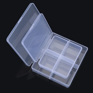 Close-up of clear PP plastic storage organizer boxes with 1-grid and 4-grid compartments