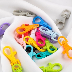 Detailed view of colorful plastic lobster clasps for DIY jewelry and keychains