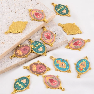 Macro shot of vintage colorful enamel flame eye pendants with beaded gold frames