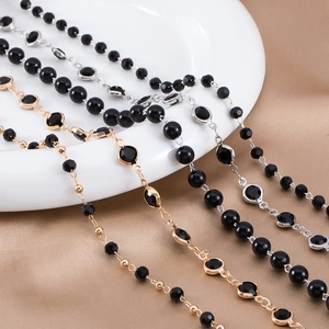 Detail of 3-8mm black beaded copper chains with faceted stones for DIY jewelry making