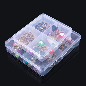 Stack of 4-compartment transparent plastic storage boxes filled with jewelry beads