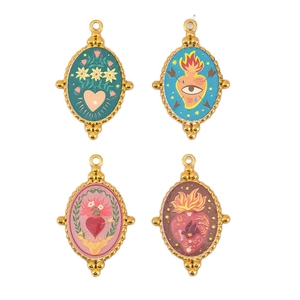 Set of four vintage stainless steel oval pendants with eye and flame enamel designs