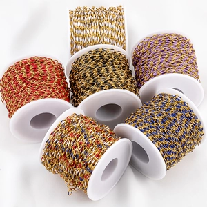 DIY gold twisted oval chains with colorful enamel on white spools for jewelry making