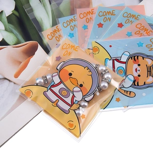 Pulseras de perlas en bonitas bolsas de embalaje autoadhesivas de animales astronautas