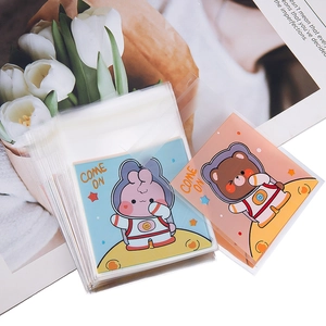 Bolsas transparentes autoadhesivas con tarjetas de conejo y oso astronautas