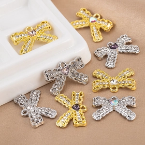 Sparkling vintage bow pendant with heart crystal and rhinestones for DIY jewelry making