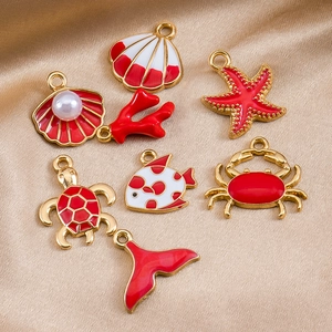 Set de dijes de océano rojo dorado con estrella de mar y tortuga para crear bisutería
