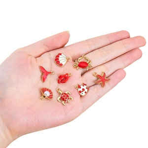 Set de dijes océano esmalte rojo con estrella de mar y tortuga para joyería DIY