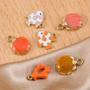 Enameled ocean charms set with starfish and shells for DIY jewelry making