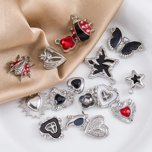 Silver plated alloy charms set with black enamel and red zircons for DIY jewelry