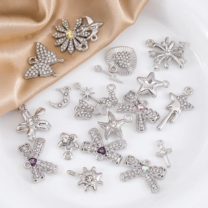Silver alloy charms set with rhinestones featuring heart moon and star motifs