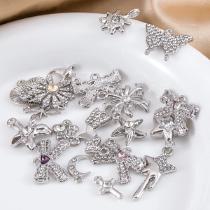 Silver alloy pendants with heart, star, and bow designs encrusted with sparkling rhinestones