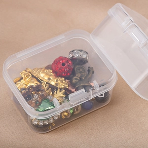 Transparent PP plastic mini storage box with lid filled with jewelry and craft accessories
