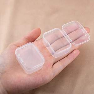 Mini transparent PP plastic storage box with flip lid held in hand for size display